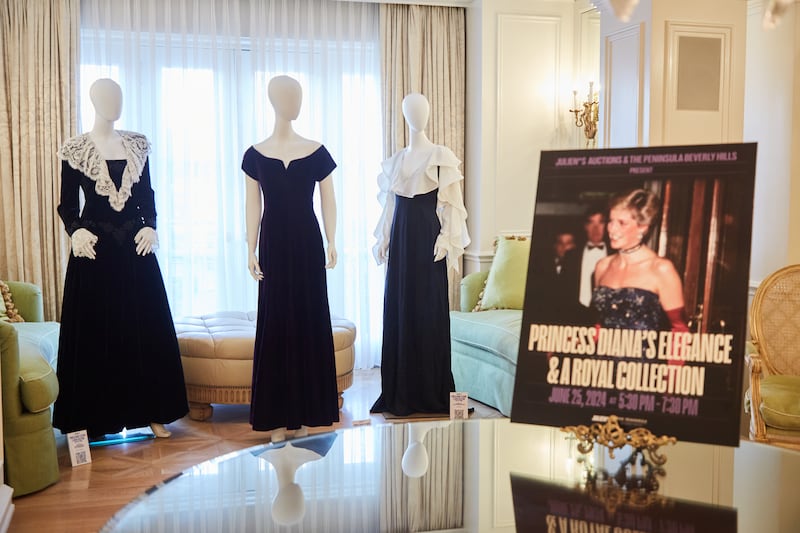 A collection of gowns featured in Princess Diana’s Elegance & A Royal Collection (Julien’s Auctions)