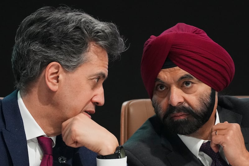 Ajay Banga, World Bank president, right, and Energy Secretary Ed Miliband speaking during a methane summit at Cop29 (AP Photo/Sergei Grits)