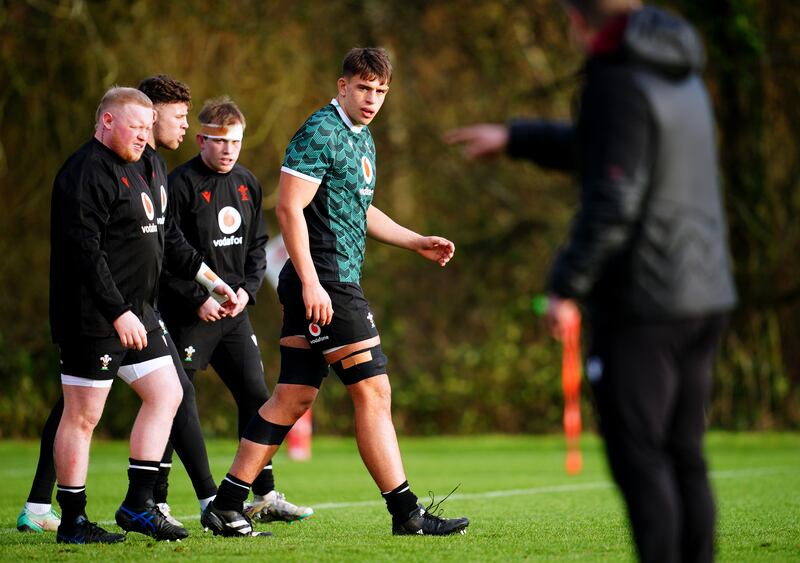 Dafydd Jenkins (centre) training with Wales ahead of the Six Nations