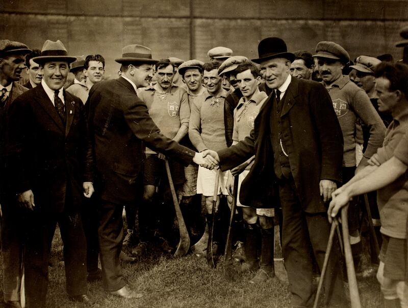 Michael Collins shakes hands with GAA President James Nowlan before the Leinster SHC final between Dublin and Kilkenny in 1921. Also pictured beside Collins is Harry Boland, who played the 1908 hurling final for Dublin, refereed the 1914 football decider, and would subsequently be shot dead by Free State Army forces during the Civil War, less than a year after this picture was taken.