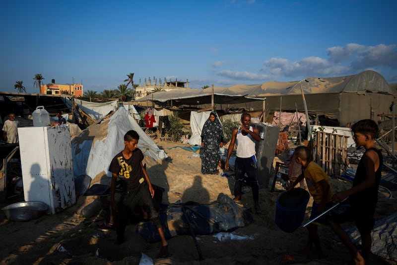 The strike hit Muwasi, a sprawl of crowded camps along the Gaza coast that Israel designated as a humanitarian zone (Abdel Kareem Hana/AP)