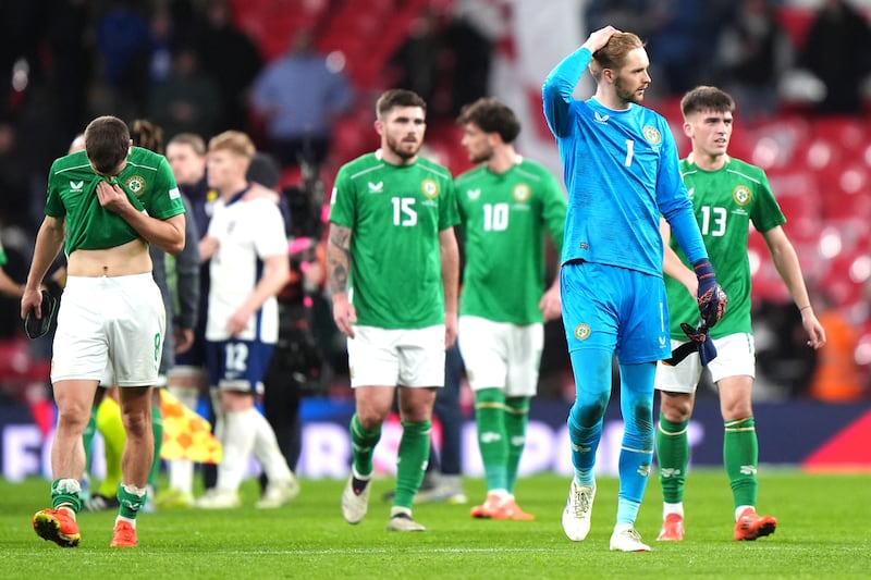 Caoimhin Kelleher (second right) and team-mates look dejected at the final whistle