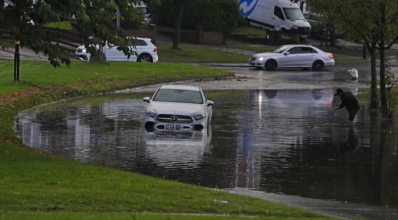 A car in flood water on Aldridge Road in Perry Bar, Birmingham