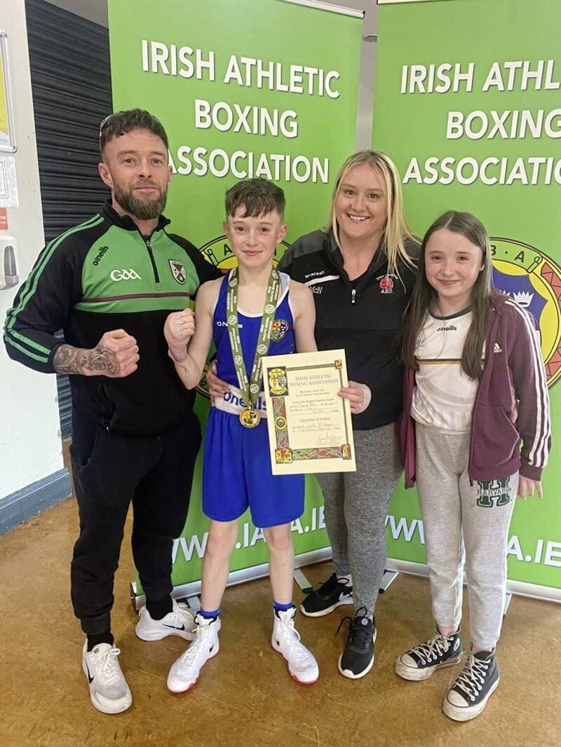 Irish boy 4 champion Daithi McNamee celebrates with dad Marty, mum Laura and sister Cobhlaith after his weekend win at the National Stadium. Other Two Castles boxers who put up impressive displays in Dublin were Conan McSorley and Ronan McBrearty 
