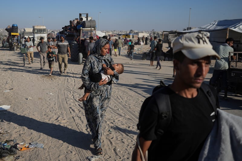 Palestinians fleeing the Khan Younis area (Abdel Kareem Hana/AP)