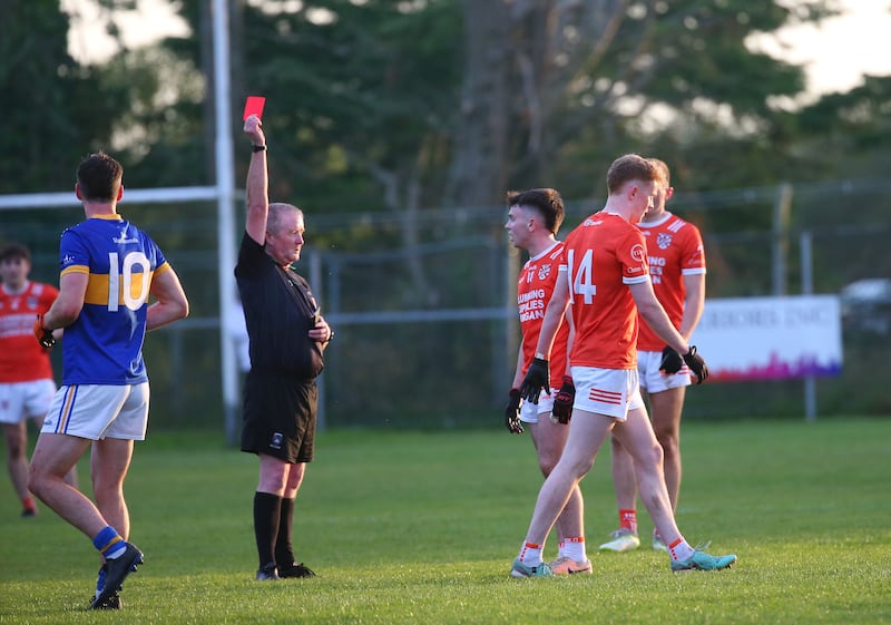 Clann Eireann’s Conor Turbot is sent off  during Saturday’s  Championship game in Maghery.
PICTURE COLM LENAGHAN