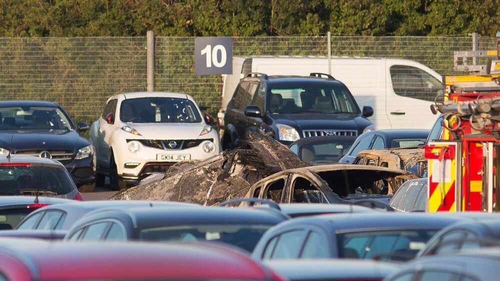 FOUR people died after a private jet crash-landed in a car auction site in England. Picture by Daniel Leal-Olivas, Press Association 
