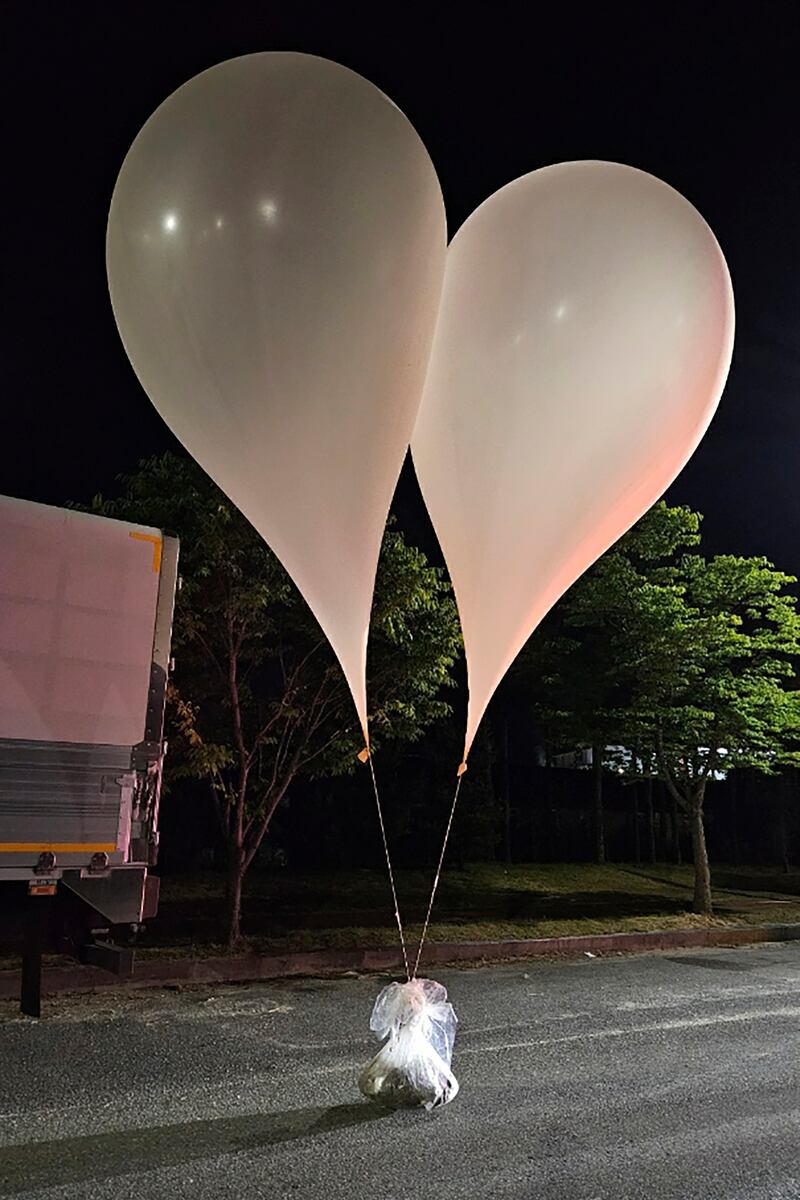 FILE – Balloons with trash presumably sent by North Korea, in South Korea (South Korea Defence Ministry/AP)