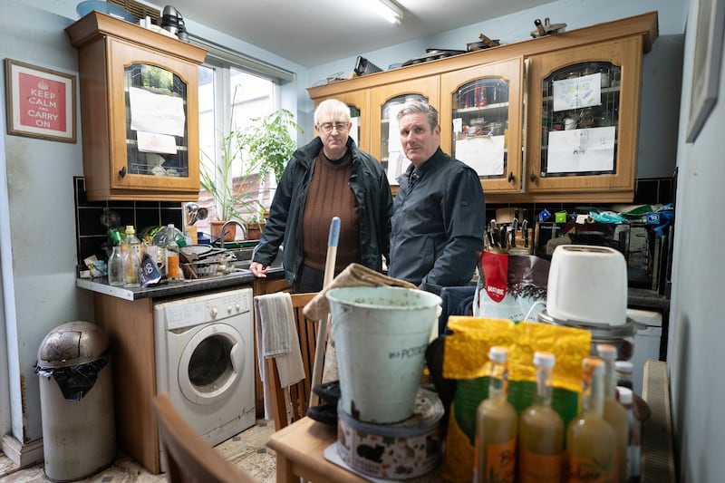 Labour leader Sir Keir Starmer with Ian Clements whose house in Loughborough flooded during Storm Henk