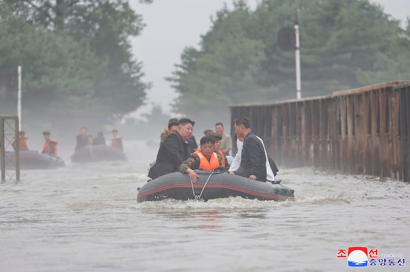 In this photo provided by the North Korean government, North Korean leader Kim Jong Un inspects a flood-hit area in Sinuiju city (KCNS/AP)