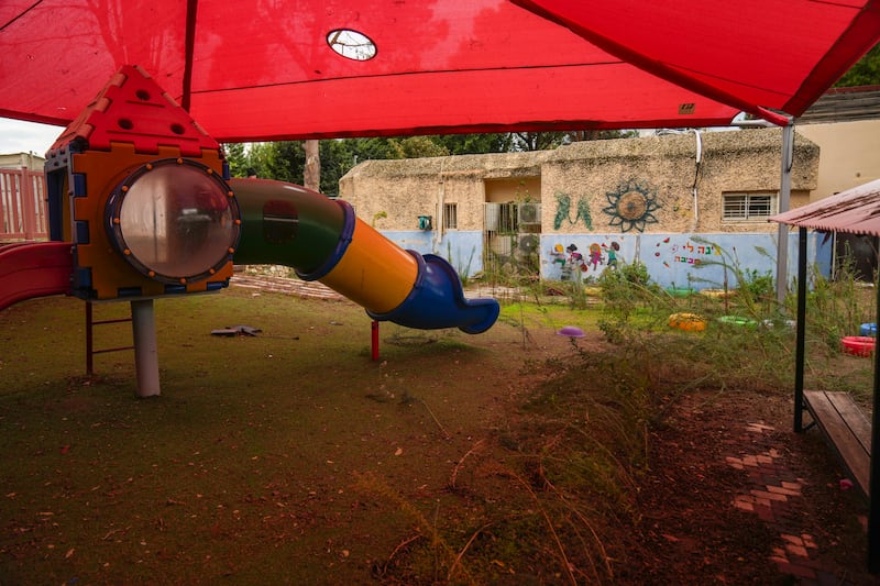 Weeds grow in a deserted playground in Shlomi, northern Israel, near to the border with Lebanon (Francisco Seco/AP)