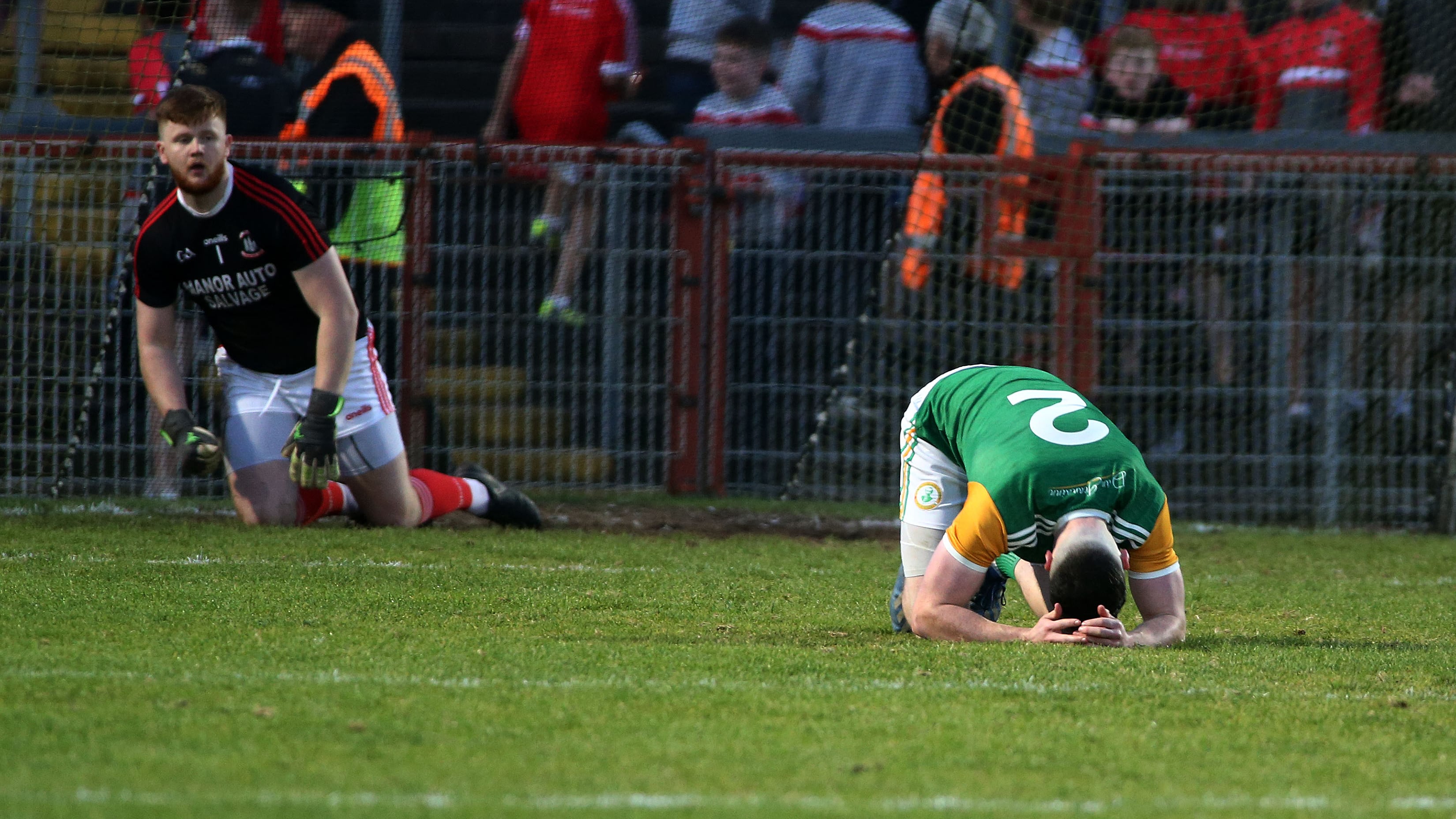 Ciaran Barker from Dungannon on his elbows and knees after missing a penalty in the Tyrone SFC final in 2020