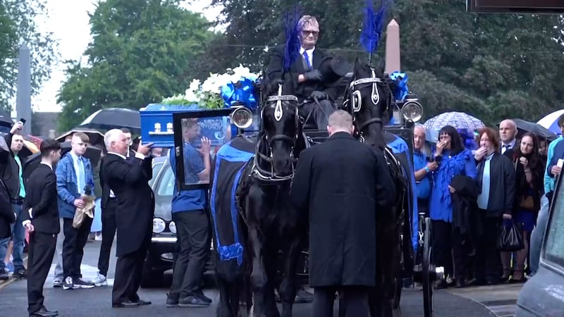 Mourners wore blue to honour the teenager’s life