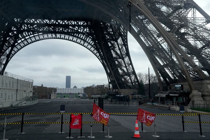 Unions flags are pictured at the Eiffel Tower during strikes by workers