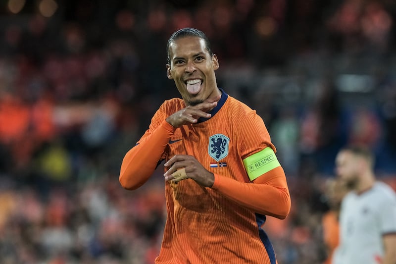 Virgil Van Dijk was among the scorers as the Netherlands thrashed Iceland (Patrick Post/AP)