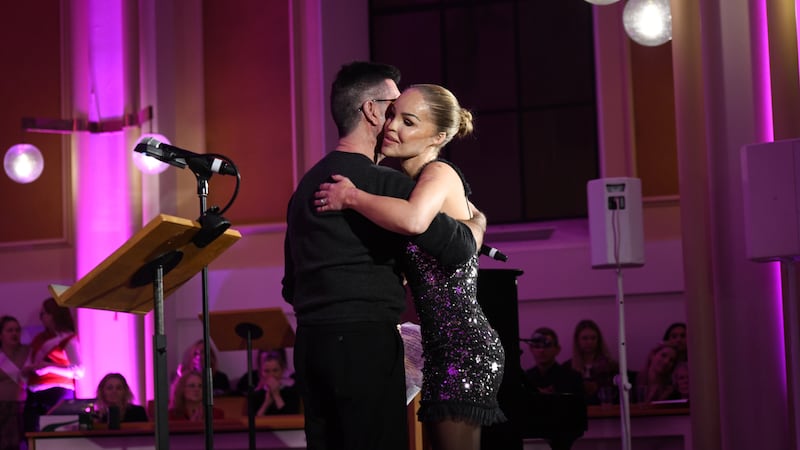 Katie Piper and Simon Cowell at the third annual Katie Piper Foundation Carol Concert . Pictures: Zak Walton.