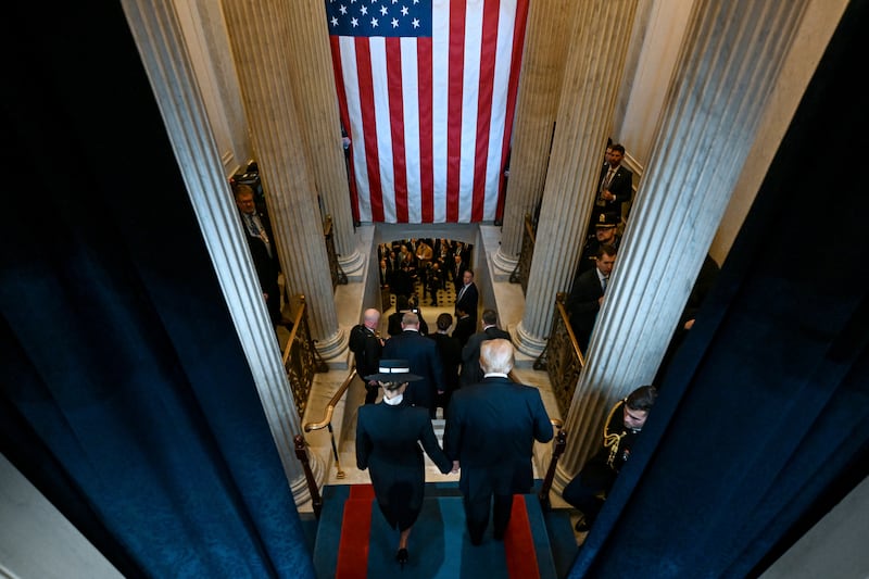 President Donald Trump and first lady Melania Trump depart after the 60th Presidential Inauguration (Kenny Holston/The New York Times via AP, Pool)