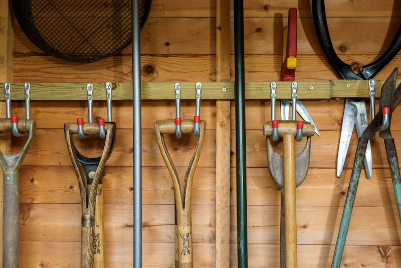 Hanging tools using wall hooks saves space