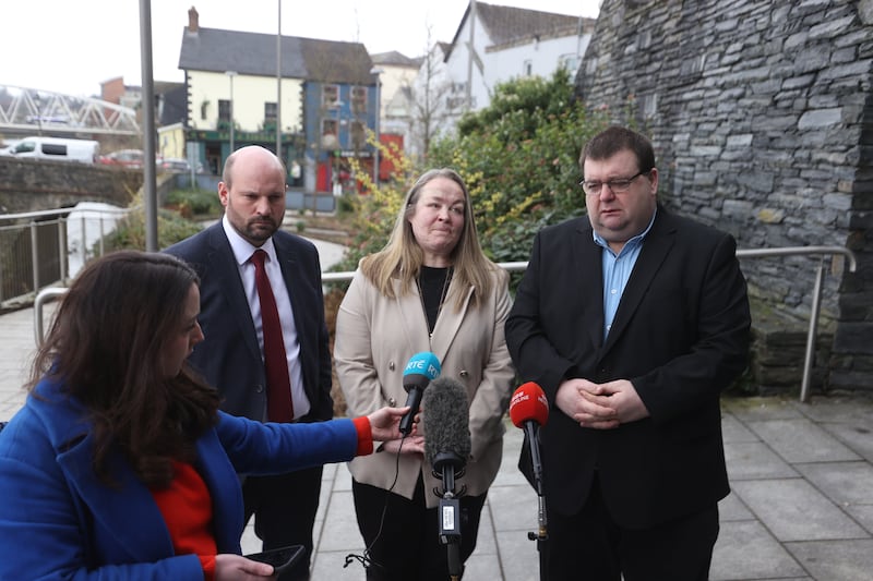 Omagh bombing survivors Donna-Marie McGillion and Garry McGillion, with solicitor John Fox (left)