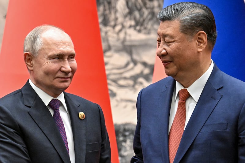 Vladimir Putin and Xi Jinping met in Beijing earlier this month (Kremlin Pool Photo/AP)