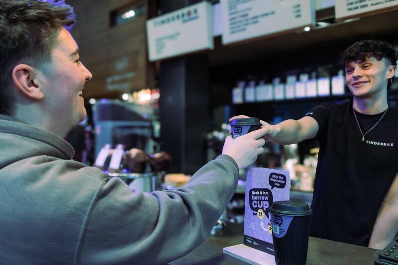 A Borrow Cup being used in a coffee shop