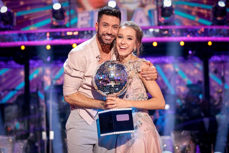 Rose Ayling-Ellis and Giovanni Pernice with the glitterball trophy during the final of Strictly Come Dancing 2021