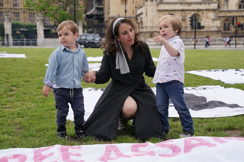 In 2021, Stella Moris and her children Gabriel (right) and Max joined supporters for a picnic in Parliament Square, central London, to mark their father Julian Assange’s 50th birthday