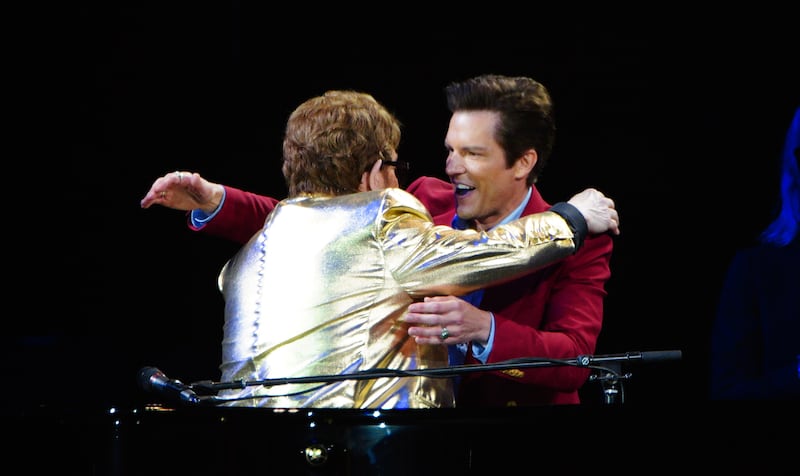 Brandon Flowers performing with Sir Elton John on the Pyramid Stage at the Glastonbury Festival