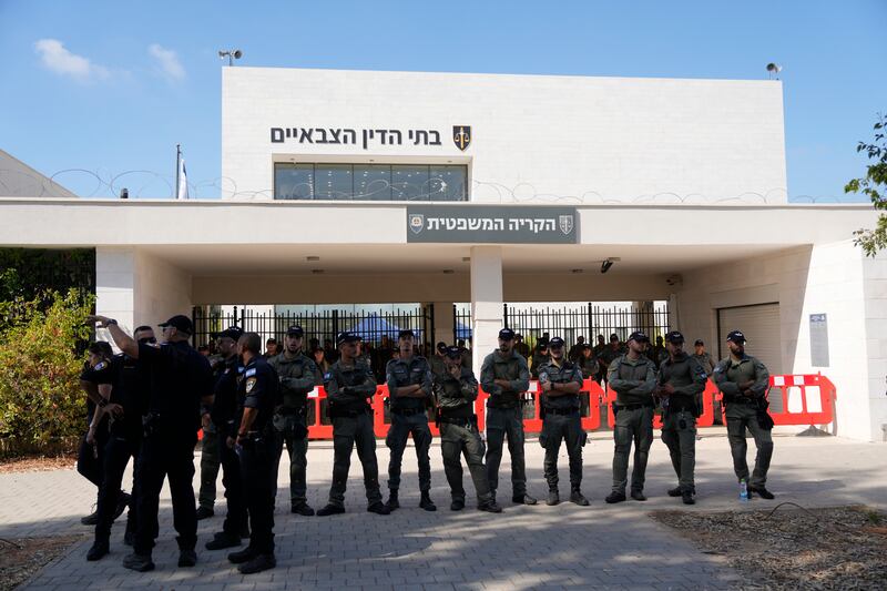 Israeli police stand guard during the right-wing protest (Ohad Zwigenberg/AP)