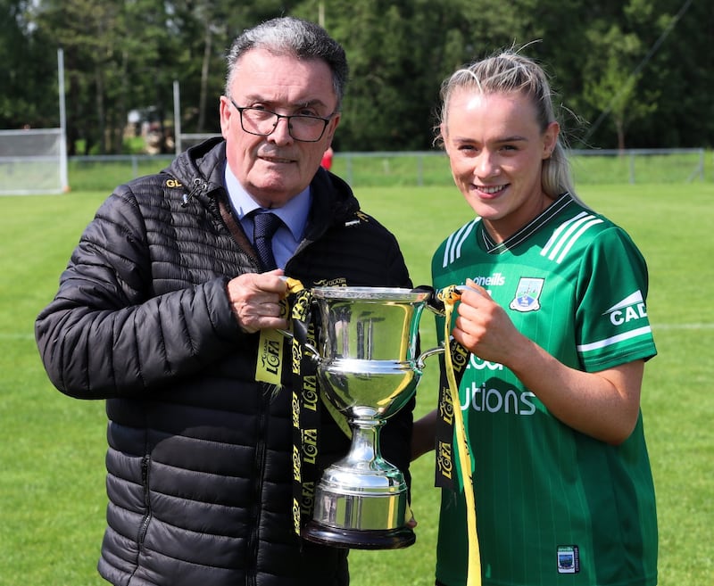 Fermanagh captain Shannan McQuade, was presented with Ulster Junior Championship trophy by Ulster LGFA President Gerry Doherty    Picture: Martin McBrien