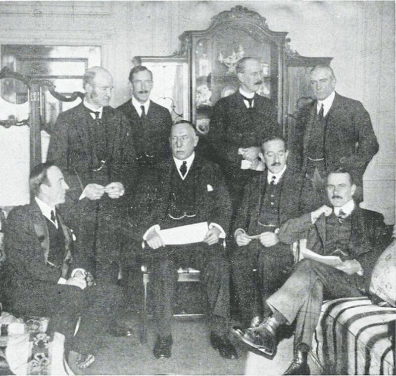 Pictured is James Craig (centre), the first Prime Minister of Northern Ireland, with members of his cabinet in 1921. 