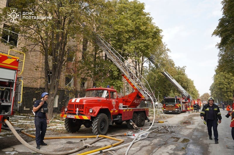 Rescue workers work at a site of military university hit by a Russian strike in Poltava, Ukraine on September 4 (State Emergency Service of Ukraine/AP)