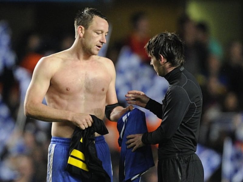 Chelsea's John Terry and Barcelona's Lionel Messi