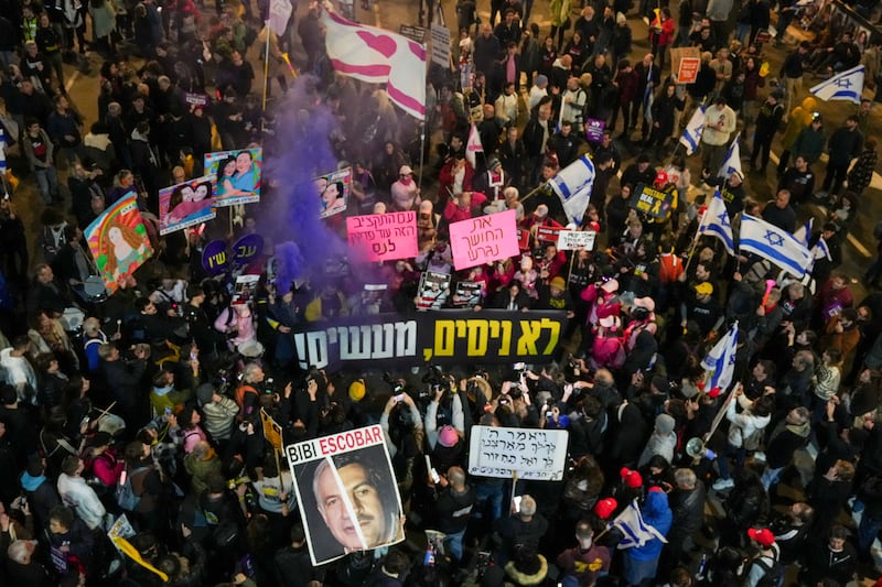 Israelis protest in Tel Aviv on Saturday against Prime Minister Benjamin Netanyahu’s government and call for the release of hostages held in the Gaza Strip by the Hamas militant group (Ariel Schalit/AP)