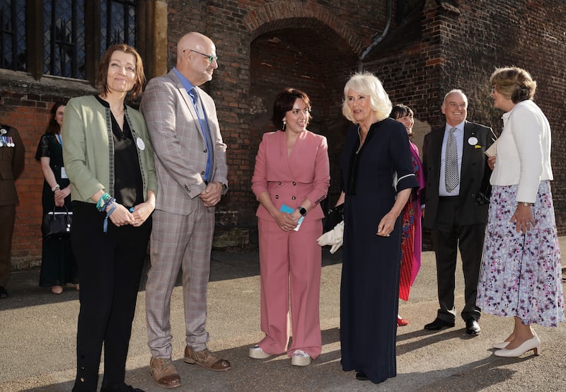 Elif Shafak and Harlan Coben welcome the Queen to a reception at Hampton Court Palace