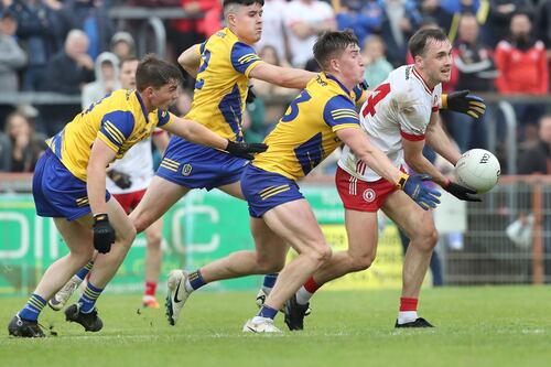 Tyrone slip silently out Championship as Roscommon roar through
