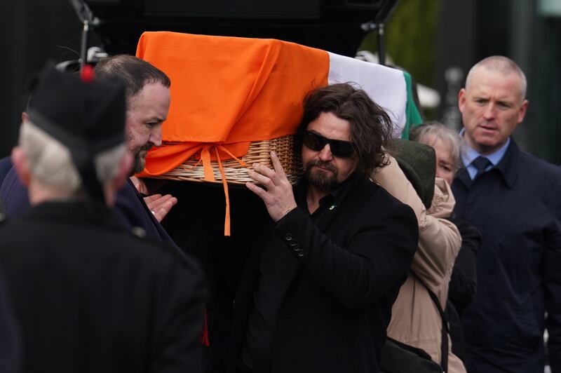 Ruairi Gallagher (front right), the son of veteran republican Rose Dugdale, helps carry her coffin to the Crematorium Chapel in Glasnevin .