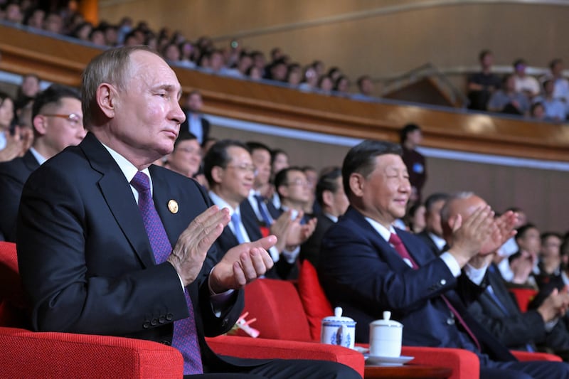 Vladimir Putin and Xi Jinping attend a concert marking the 75th anniversary of the establishment of diplomatic relations between Russia and China (Sergei Guneyev, Sputnik, Kremlin Pool Photo via AP)