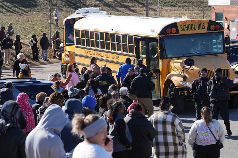 A school bus arrives at a unification site following the shooting at Antioch High School (George Walker IV/AP)