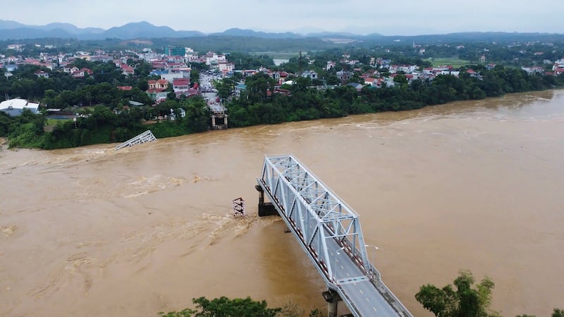 A bridge collapse due to floods triggered by typhoon Yagi in Phu Tho province (Bui Van Lanh/ VNA via AP)