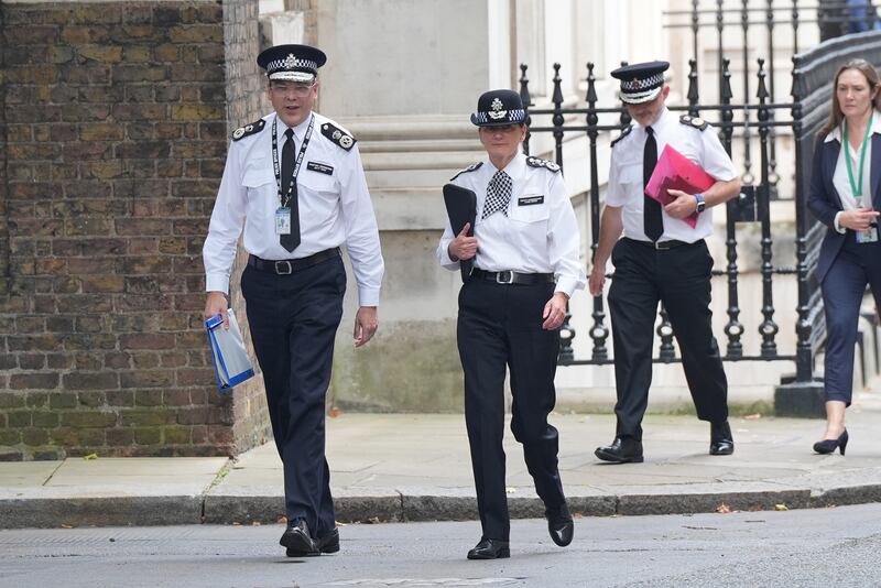 Metropolitan Police Assistant Commissioner Matt Twist and Deputy Commissioner Lynne Owens arrive in Downing Street for the meeting with the Prime Minister