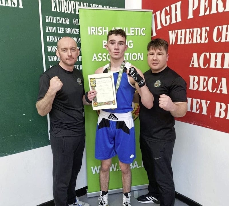 All Saints, Ballymena&rsquo;s Archie Ritchie &ndash; pictured with club coaches John Paul Larkin (left) and TJ Hamill - added to his burgeoning reputation when he picked up his second Irish title at the weekend, landing the national Boy 4 crown with a unanimous decision victory over Carndonagh&rsquo;s Kieran Cunningham in the 66kg final. Gleann&rsquo;s Caoimhin Hughes took the 33kg title on a walkover, while Holy Family&rsquo;s Flynn Lyttle, Oliver Plunkett&rsquo;s Conor Fox, Belfast Kronk&rsquo;s Oisin Dunlop, Star&rsquo;s John Patrick McKinney, Glengormley pair Aodhan Scott and Caoimhin Doherty, and the Clonard trio of Sean Gray, Chelsea Coiley and Hannah Masterson all acquitted themselves well in their respective finals 