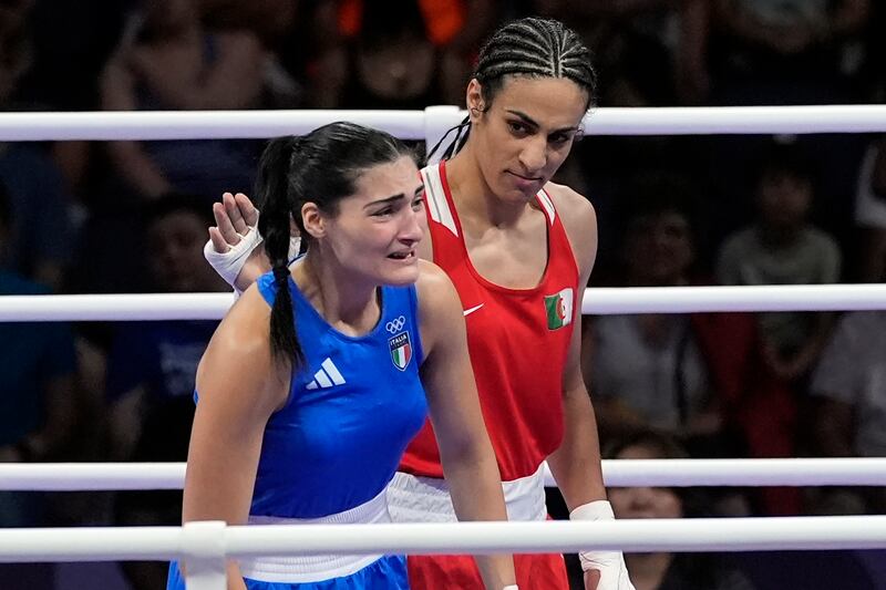 Algerian boxer Imane Khelif, right, looks at Italy’s Angela Carini, following their bout at the 2024 Paris Olympics (AP)