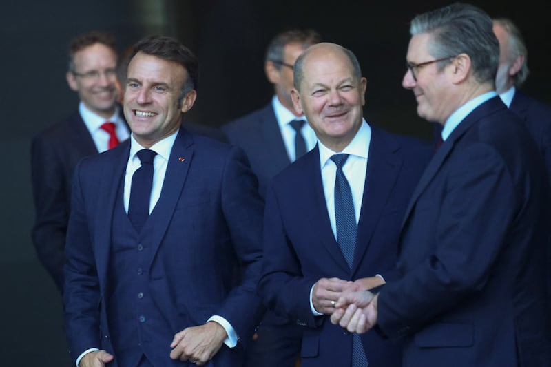 (left-right) French President Emmanuel, German Chancellor, Olaf Scholz and Prime Minister Sir Keir Starmer, at the Chancellery in Berlin