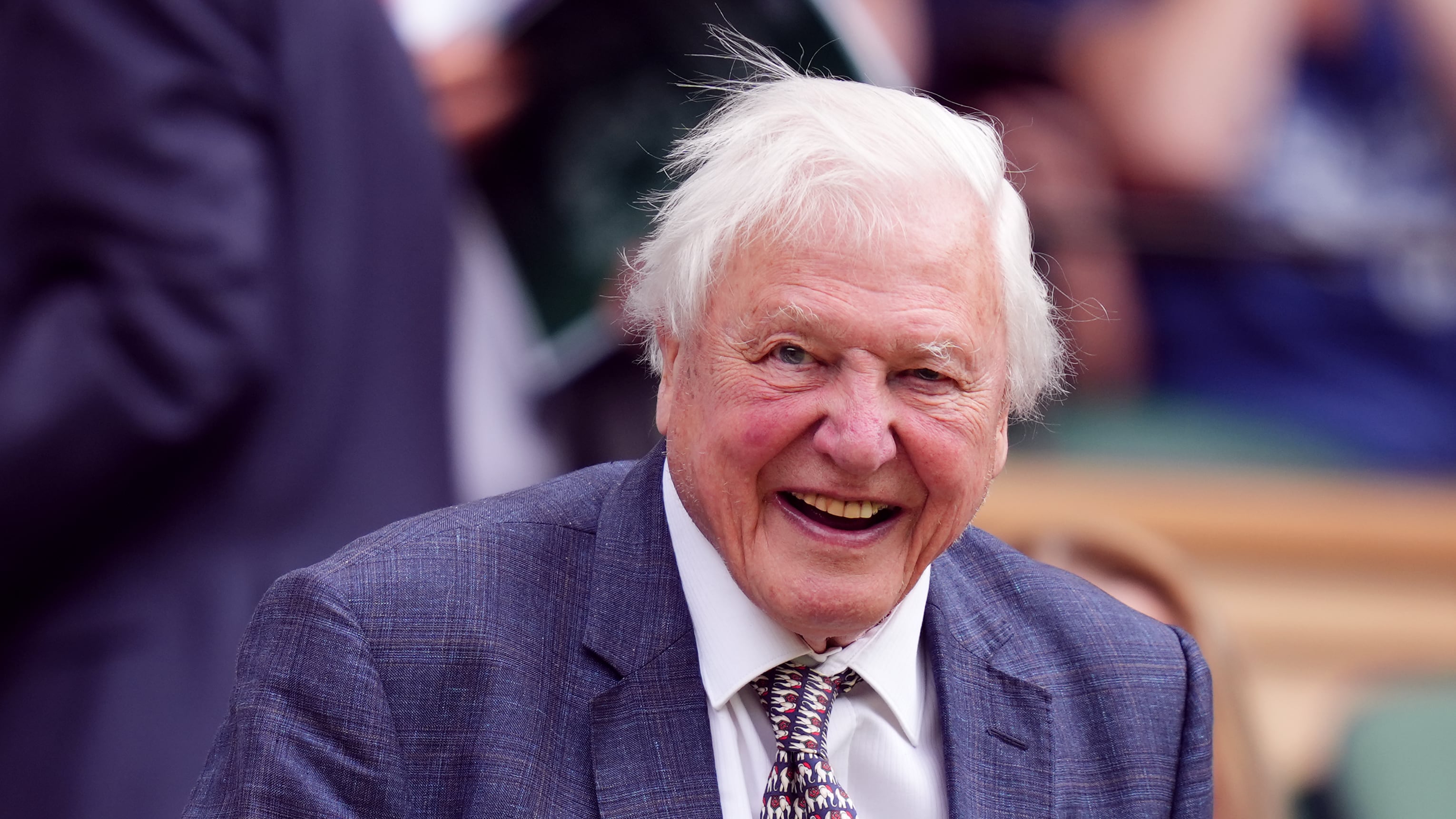 Sir David Attenborough appeared in good spirits as he arrived in the royal box on Centre Court on the first day of Wimbledon