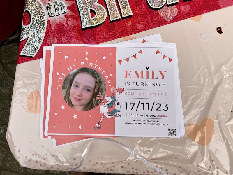 A birthday spread on a table at the entrance to St Stephen’s Green in Dublin for Irish Israeli girl Emily Hand on November 17, her ninth birthday (David Young/PA)