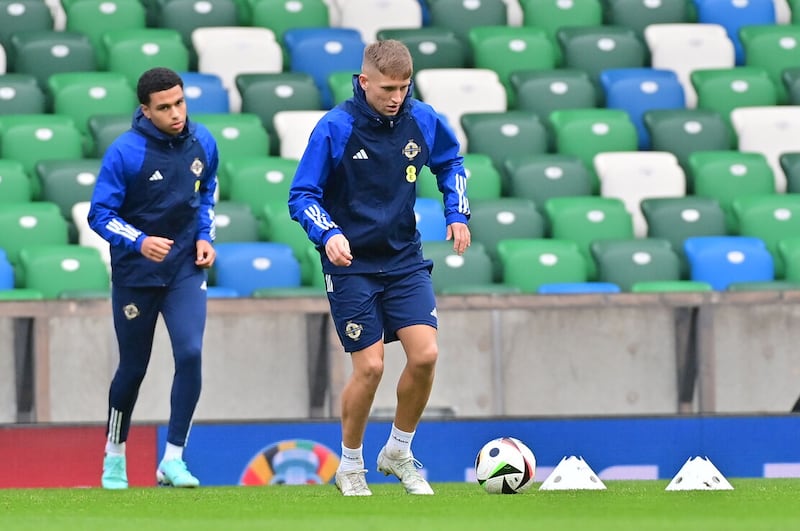 Shea Charles (left) is available for Northern Ireland after missing the Finland game due to suspension.