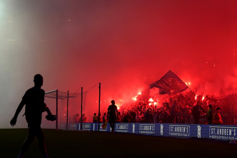 Rangers fans set off flares in the stands during the Trevor Francis memorial match at St Andrew’s