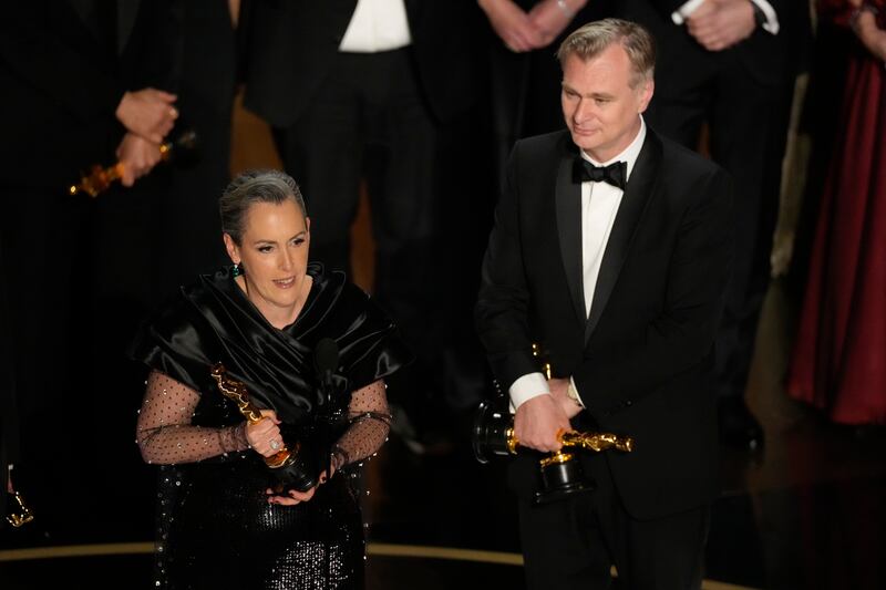 Emma Thomas, left, and Christopher Nolan accept the award for best picture (AP Photo/Chris Pizzello)