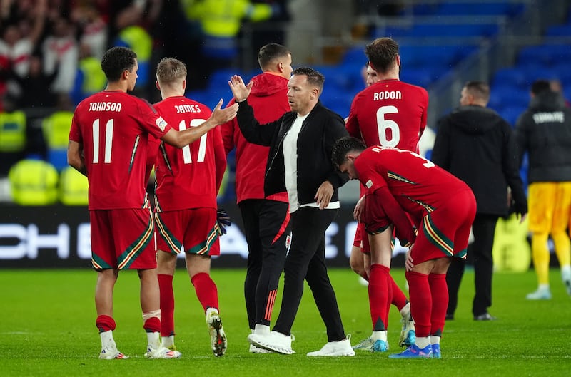 Wales manager Craig Bellamy congratulates his players in September following an impressive performance against Turkey in his first match in charge